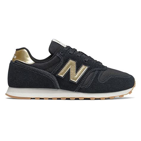 New Balance Womens 373 In Black Gold Neon