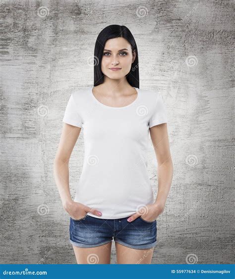 Brunette Girl In A White T Shirt And Denim Shorts Stock Photo Image