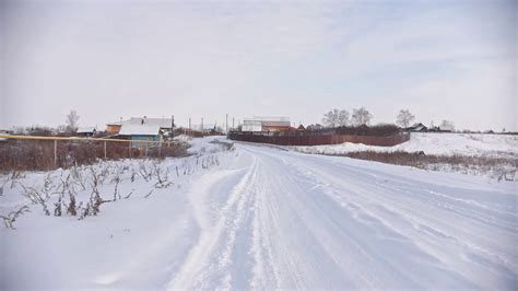 Russian winter village - countryside in center of Volga, snow cold day ...