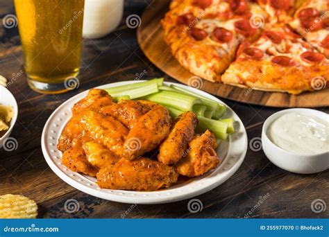 Homemade Pepperoni Pizza Chicken Wings And Beer Stock Photo Image Of