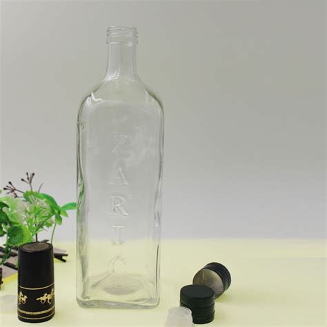 China Carve Olive Transparent Square Oil Glass Bottle Container