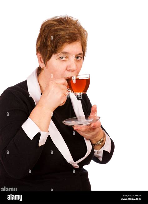 Mature Woman Having Cup Of Tea Isolated Stock Photo Alamy
