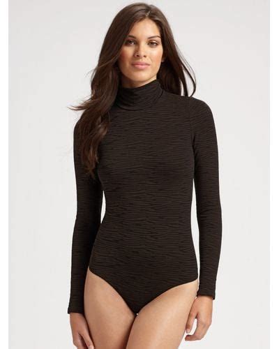 Wolford Wilderness Mock Turtleneck Bodysuit In Black Lyst