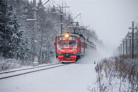 Russian Train in the Winter. the Train Rides by Rail in the Winter in ...