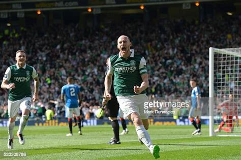 David Gray Of Hibernian Celebrates Scoring The Winning Goal As News