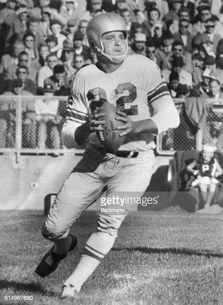 Detroit Lions quarterback Bobby Layne gets ready to throw the ball ...