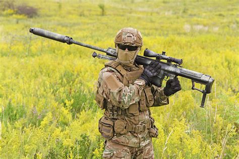 Soldier With Big Sniper Rifle Walking Photograph By Oleg Zabielin Fine Art America