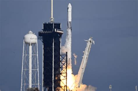 Spacex Resupply Cargo Capsule Docks With International Space Station