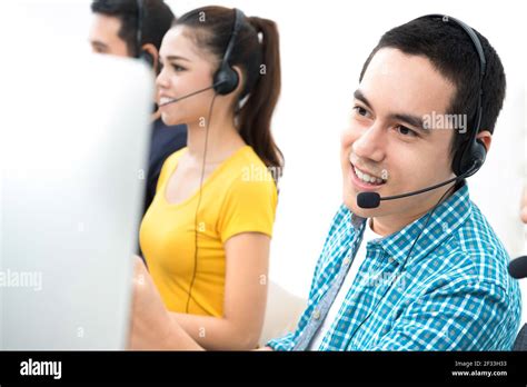 Young Asian Operator Team In Call Center Stock Photo Alamy