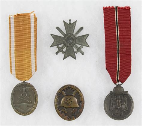 Lot - GERMAN MEDALS GROUPING (4)