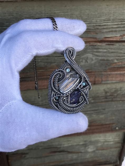 Tanzanite And Danburite Wire Wrap With Blue Apatite Facets Silver