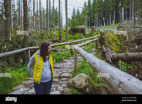 Brunette Woman Hiker Hiking On Trail In Summer Time Tatra Mountain In