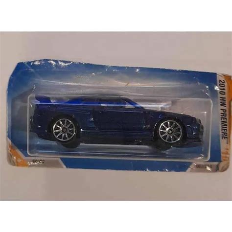 Embalagem Danificada Hot Wheels Premiere Nissan Skyline GT R R Universo Hot Wheels