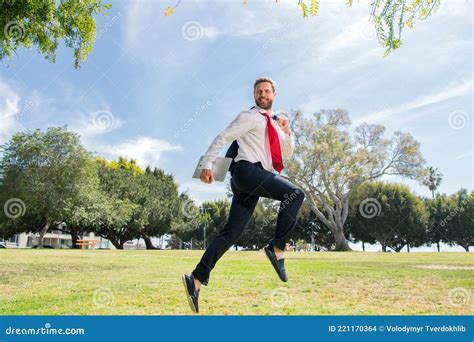 Running Businessman Ready To Run Jump And Sprint Stock Photo Image