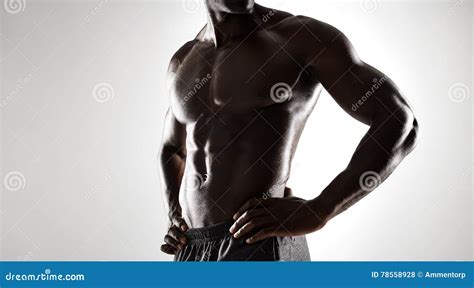 African Man With Muscular Body On Grey Background Stock Photo Image