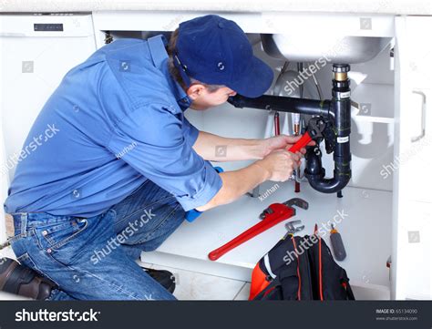 Mature Plumber Fixing A Sink At Kitchen Stock Photo 65134090 Shutterstock