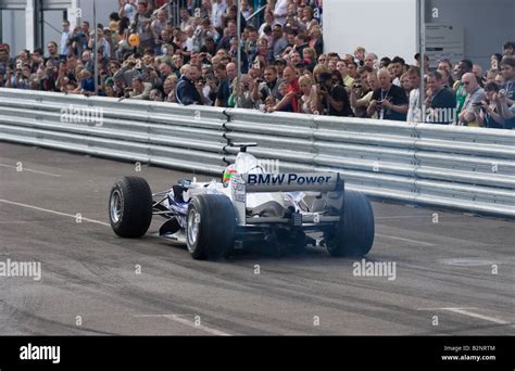 Augusto Farfus Driving A Bmw Sauber Formula One Car At The Pit Lane