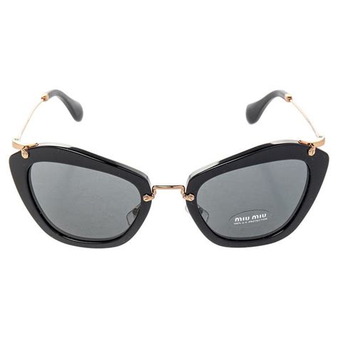 Miu Miu Goldblack Smu 10n Cat Eye Sunglasses At 1stdibs