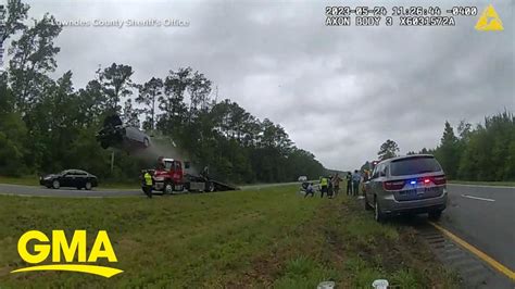 Police Cam Shows Moment Car Flips Over Tow Truck On Highway L Gma Youtube