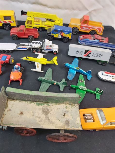 Assorted Toy Cars, Planes and Space Rockets - Sunrise Estate Services Ltd