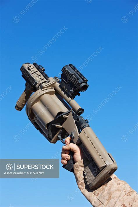 U.S. Marine Holding a Milkor M32 MGL, or Multiple Grenade Launcher ...