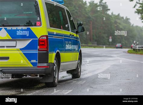 Side View Of A Police Car Vehicle In An Emergency Parking Bay Police