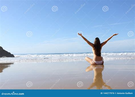 Happy Woman In Bikini Celebrating Vacation On The Beach Stock Photo