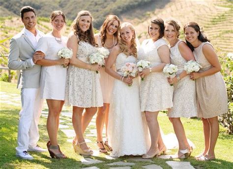 A Group Of Women Standing Next To Each Other