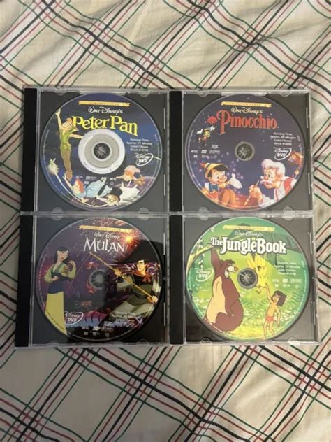 DISNEY DVDS LIMITED Edition Set Of 4 Jungle Book Mulan Peter Pan