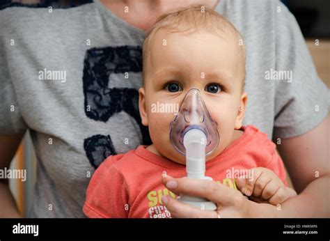 Child Making Inhalation With Mask On His Face Asthma Problems Concept