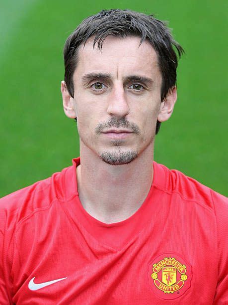 Gary Neville Of Manchester United Poses During The Clubs Official