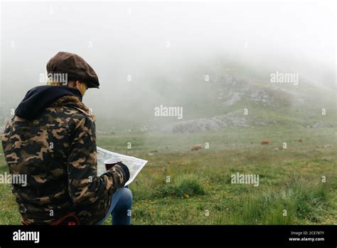 Nude Female With Bare Breast And Blue Hair Hugging Tenderly Fluffy Cat On Sunny Day Looking At