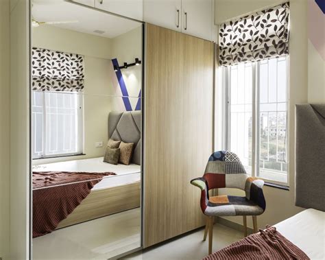 2 Door Bedroom Wardrobe Design With A Mirror Livspace