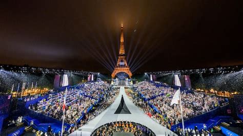 Nita And Mukesh Ambani Attend Paris Olympics Opening Ceremony Meet President Macron See Photos