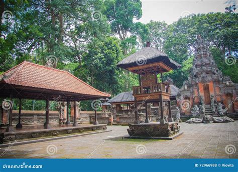 Balinese Hindu Temple With Golden Doors And Monkey Guars Sculptures