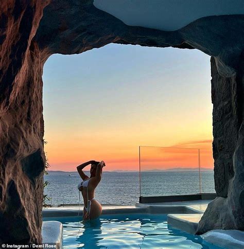 Demi Rose Flaunts Her Eye Popping Curves In A TINY White Bikini In Mykonos In White