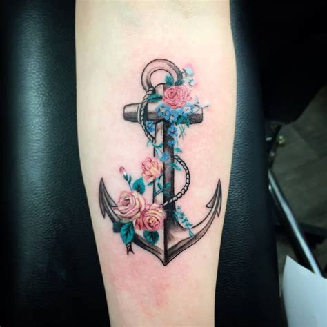 Anchor Tattoos With Flowers On Foot