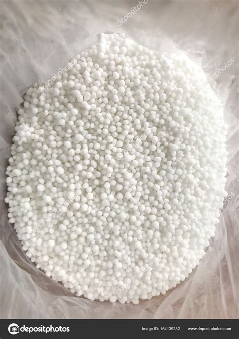 Close Up Of Urea Fertilizer In A Plastic Bag — Stock Photo © Madozi