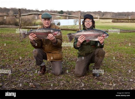 Fishermen With Large Rainbow Trout At Blackwool Farm Trout Fishery