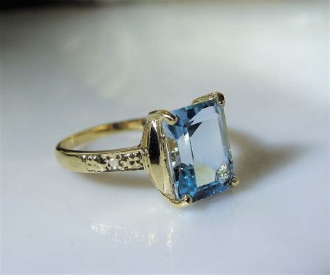 10k Swiss Blue Topaz And Diamond Ring 22 Carat Emerald Cut Blue Topaz Ring Topaz And Diamond