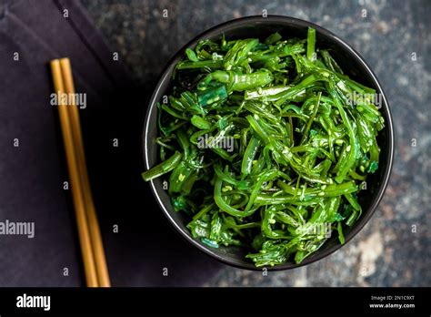 Green Seaweed Japanese Wakame Salad In The Bowl Top View Stock Photo