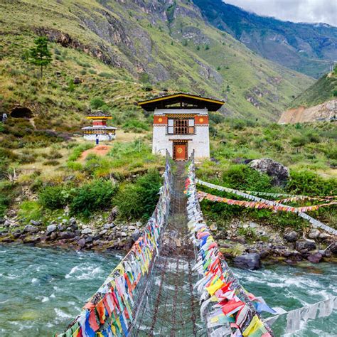 Iron Chain Bridge Leading To The Tamchog Lhakhang Monastery In Bhutan