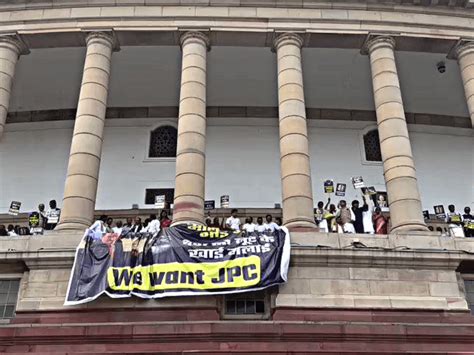 We Want Jpc Poster Hangs From Parliament House Complex Over Adani Issue