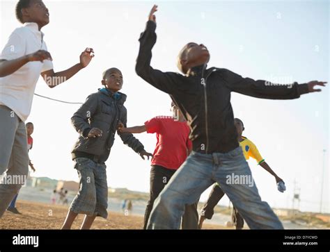 Black african boy playing soccer hi-res stock photography and images ...