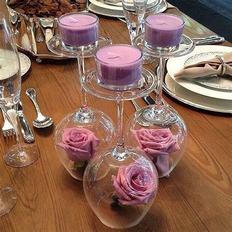 Upside Down Wine Glasses As Candle Holders And Flower Covers Romantic Candles Table