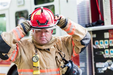 180+ Firefighter Putting On Helmet Stock Photos, Pictures & Royalty