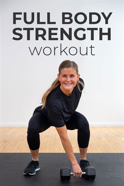 A Woman Is Doing A Full Body Strength Workout With Two Dumbbells In