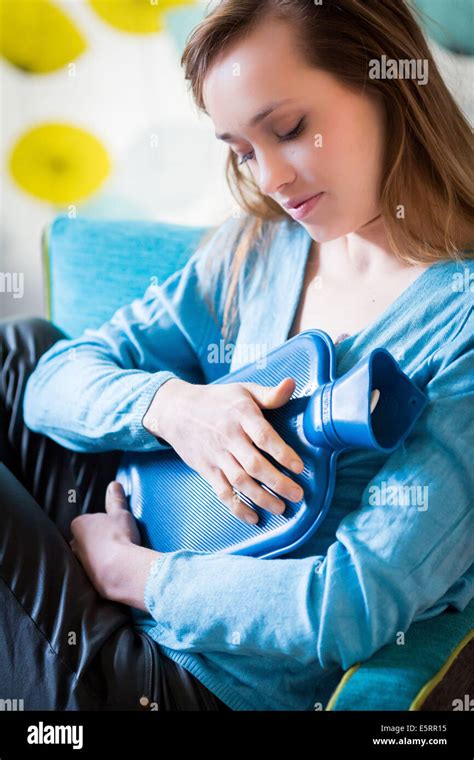 Hot Water Bottle Woman Belly Hi Res Stock Photography And Images Alamy