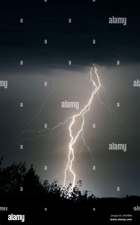 Lightning Strikes During A Thunderstorm Stock Photo Alamy