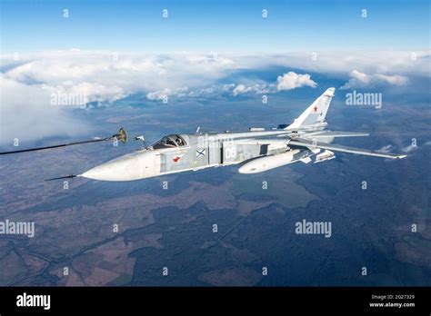 Su-24M frontline bomber plane of the Russian Navy during aerial refueling Stock Photo - Alamy